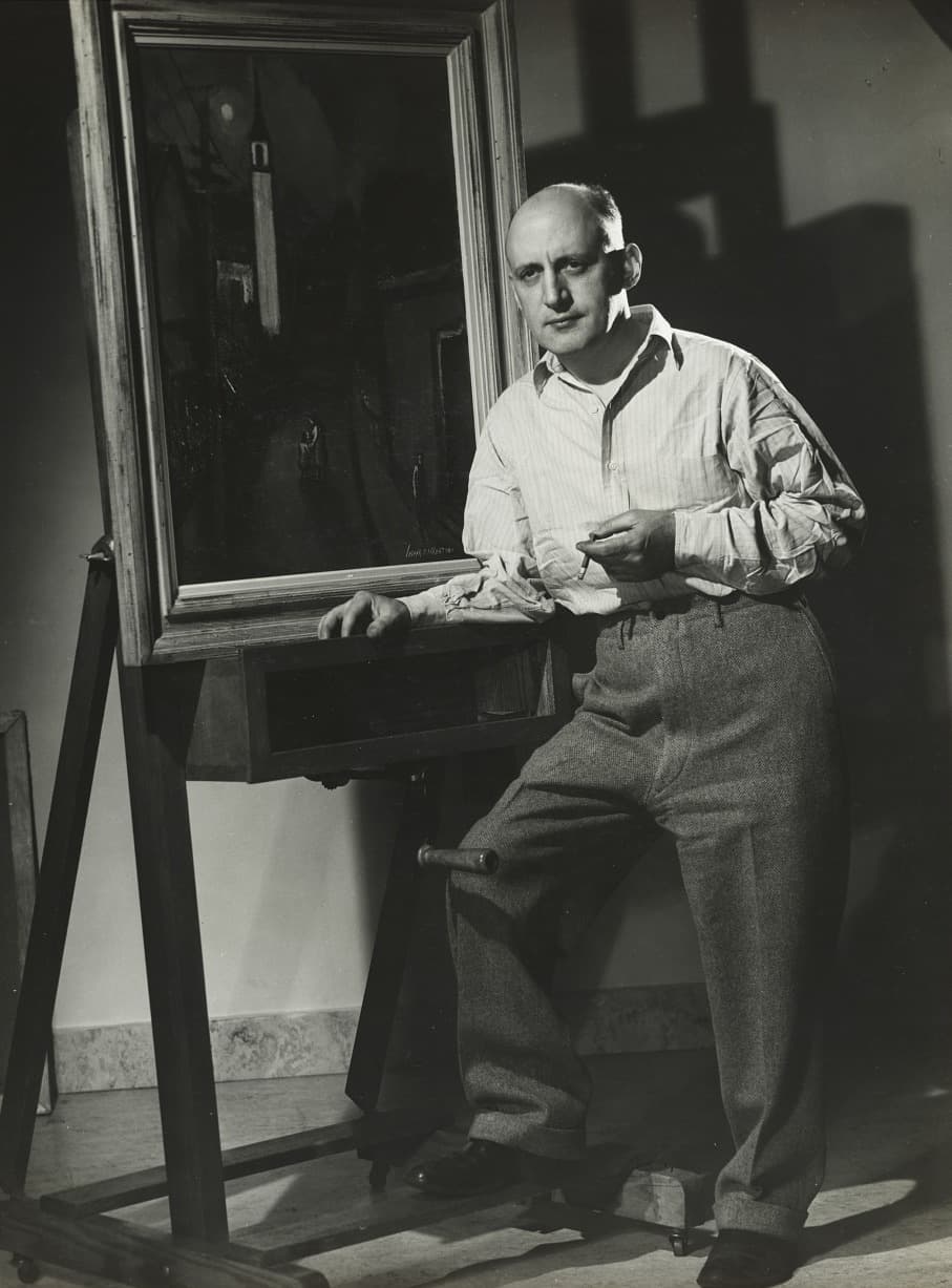 Joseph De Martini leaning on his easel